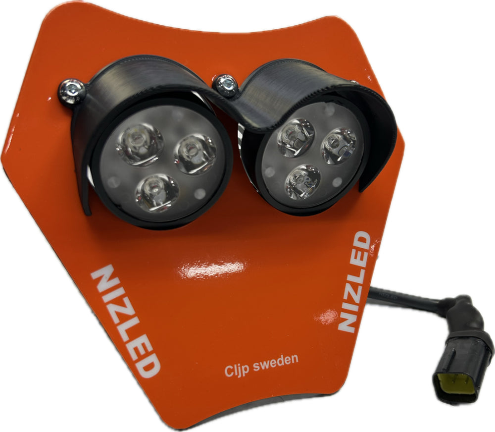 KTM lampfäste i två pris klasser, E30 35w lätt lampa, och E406k/E405k som är värstingen