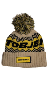 Ettobjekt mössa med toffs, Beige